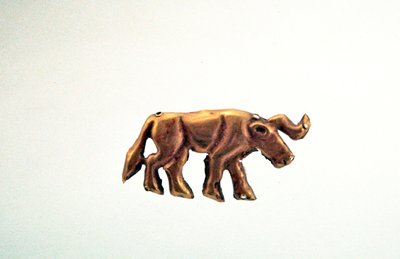Striding bull, ornament from a funerary canopy, late 3rd millennium BC by Scythian